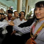 Aung San Suu Kyi arrives at Yangon airport in Burma to depart for Europe